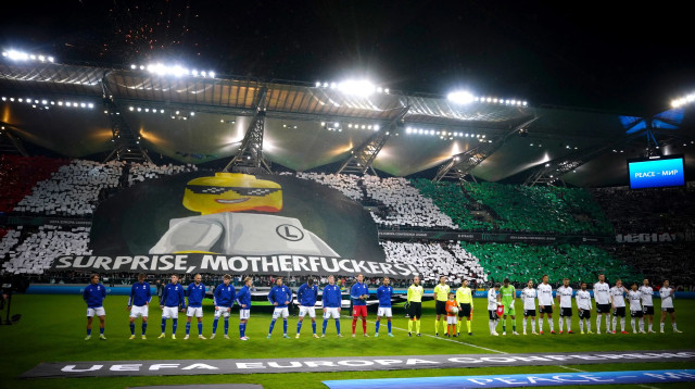 אוהדי לגיה ורשה (צילום: רויטרס)