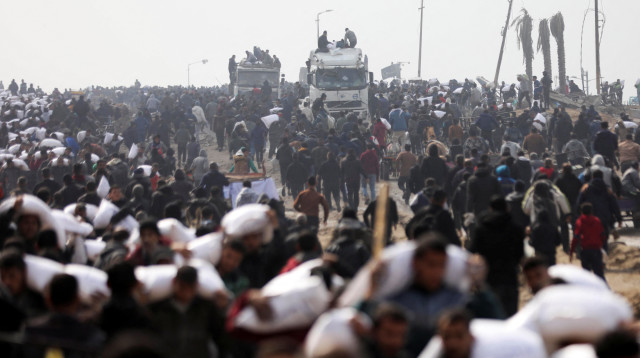 סיוע לעזה (צילום: REUTERS/Kosay Al Nemer)