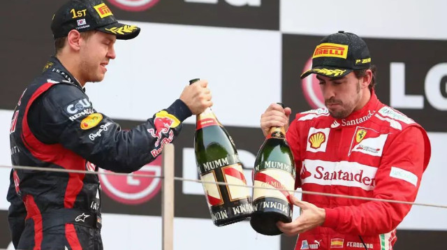 פרננדו אלונסו וסבסטיאן פטל (צילום: GettyImages, Clive Mason)