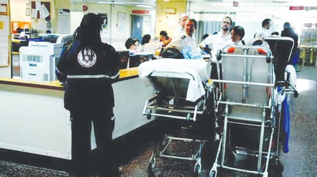 עומס בחדר מיון בבית חולים (צילום: אבשלום ששוני)