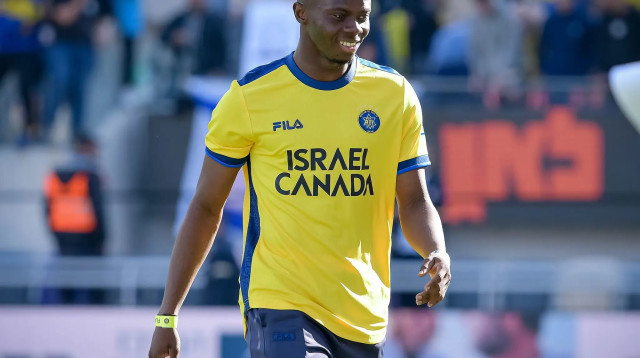 שחקן מכבי תל אביב הנרי אדו (צילום: אריאל שלום)