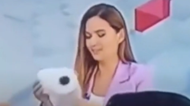 המגישה נותרה מובכת בעקבות קקי בשידור חי (צילום: RTP Channel)