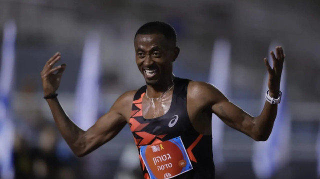 טדסה גטהון אלוף ישראל 10,000 מטר (צילום: אתר רשמי, Maxim Dupliy)