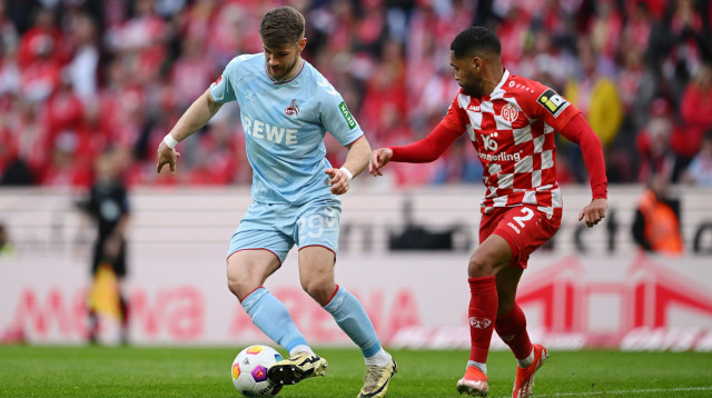 שחקן מיינץ פיליפ מוונה, מול שחקן פ.צ. קלן, יאן טילמן (צילום: GettyImages, Helge Prang)