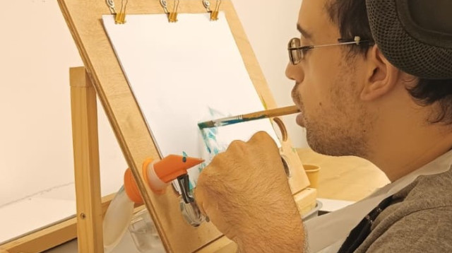 גיא, בן 28, המשתתף במרכז היום 'גלגל התנופה' מזה למעלה מ-7 שנים (צילום: עמותת בית הגלגלים)