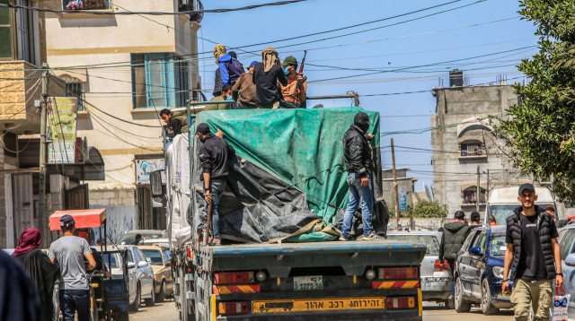 חמאס על משאיות הסיוע (צילום: עבד רחים חטיב, פלאש 90)