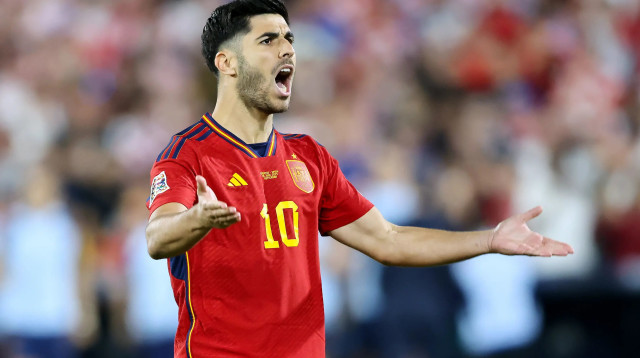 מרקו אסנסיו במדי נבחרת ספרד (צילום: GettyImages, Christof Koepsel)