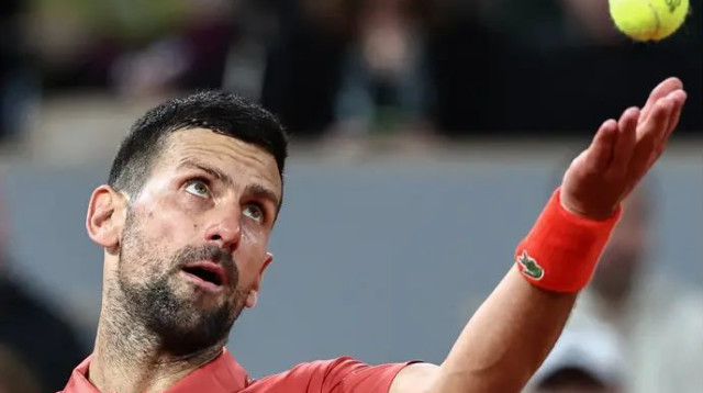 יגן על תוארו? ג'וקוביץ' (צילום: GettyImages, Anne-Christine POUJOULAT / AFP)