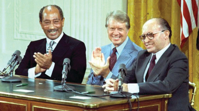 בגין, קרטר וסאדאת (צילום: ארכיון רויטרס)