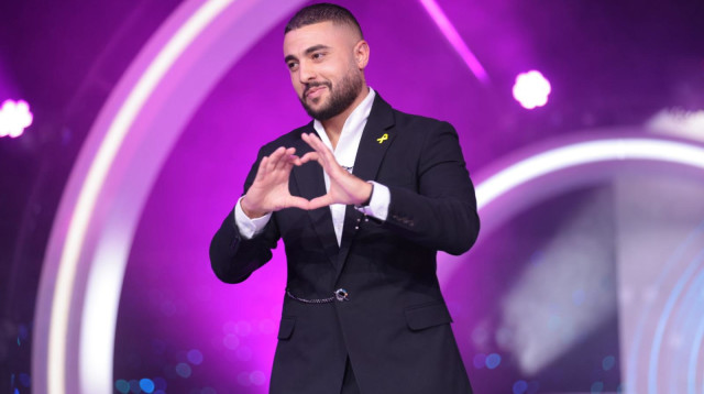 אור בן דוד בכניסה לבית "האח הגדול" (צילום: מיכה לובטון)