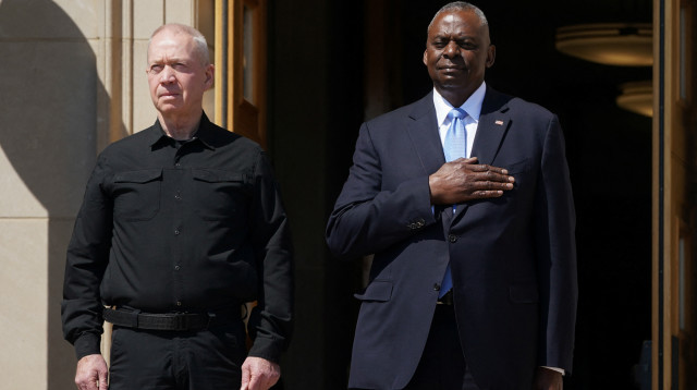 יואב גלנט, לויד אוסטין  (צילום: REUTERS/Kevin Lamarque)