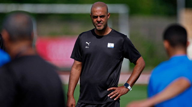 גיא לוזון, מאמן הנבחרת האולימפית (צילום: רויטרס)