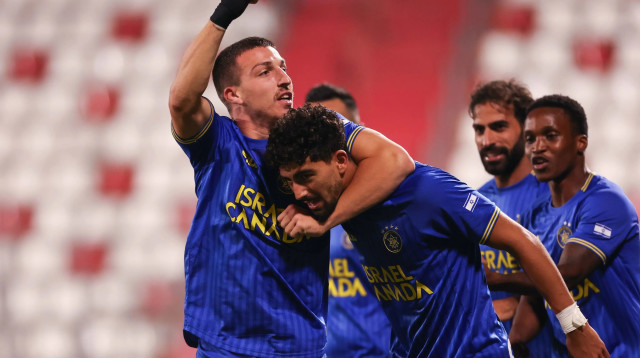 שחקני מכבי תל אביב אושר דוידה, רוי רביבו חוגגים (צילום: מאור אלקסלסי)