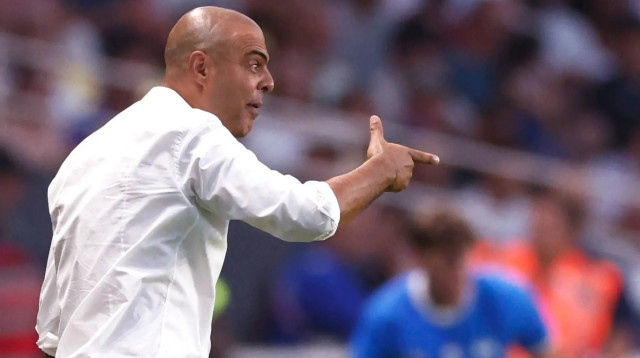 מאמן הנבחרת האולימפית גיא לוזון (צילום: רויטרס)