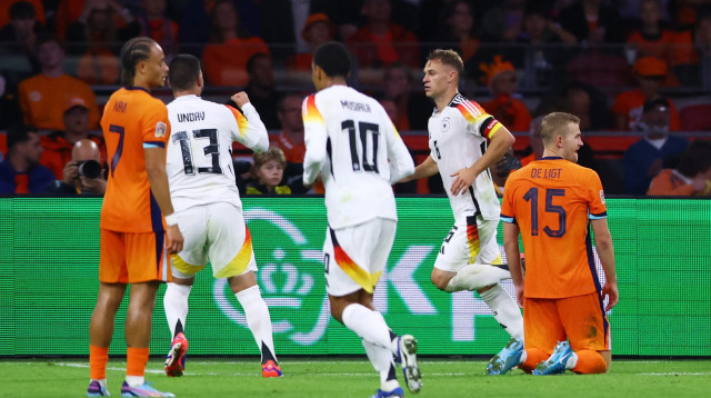 יוזואה קימיש שחקן נבחרת גרמניה חוגג שער (צילום: רויטרס)