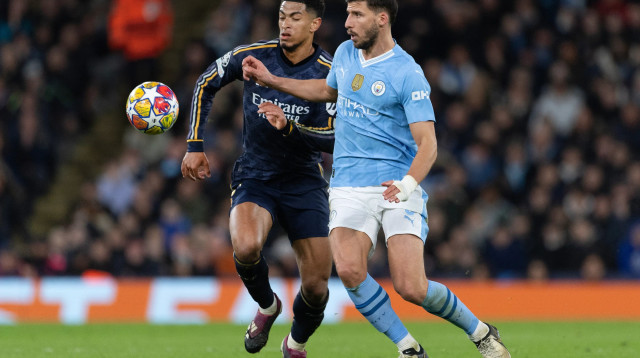 שחקן מנצ'סטר סיטי, רובן דיאש, מול שחקן ריאל מדריד, ג'וד בלינגהאם (צילום: GettyImages, Visionhaus)