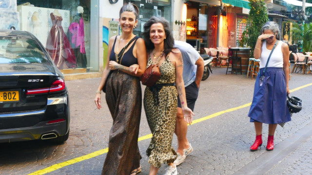 ליאור מילר מתחבא מאחורי דורין אטיאס (צילום: אמיר מאירי)