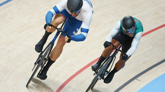 רוכב אופני המסלול הישראלי, מיכאל יעקובלב, נגד ז'איר צ'ון אן פה, סורינאם (צילום: רויטרס)