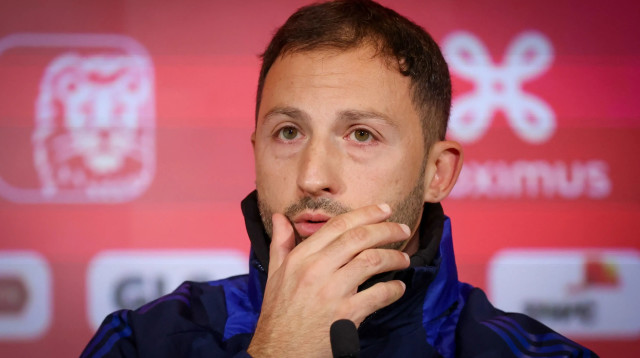 דומניקו טדסקו מאמן נבחרת בלגיה במסיבת עיתונאים (צילום: GettyImages, VIRGINIE LEFOUR/AFP)