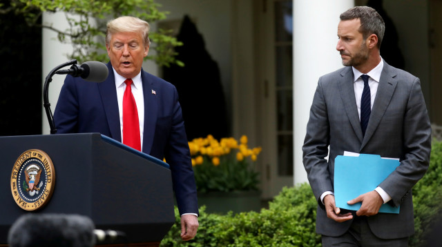 אדם בוהלר ודונלד דראמפ (צילום: רויטרס)