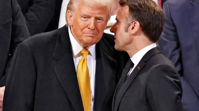 דונלד טראמפ ועמנואל מקרון בטקס באליזה (צילום: רויטרס)