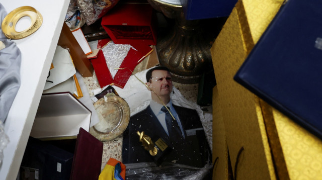 פשיטת המורדים על ארמונו של אסד (צילום: רויטרס)