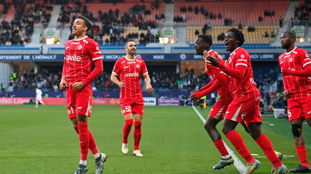 שחקני מונפלייה חוגגים (צילום: GettyImages, SYLVAIN THOMAS/AFP)