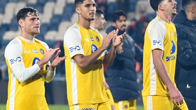 דור תורג'מן, אלעד מדמון, גבי קניקובסקי שחקני מכבי תל אביב (צילום: ברני ארדוב)