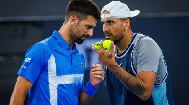 נובאק ג'וקוביץ' לצד ניק קיריוס (צילום: GettyImages)