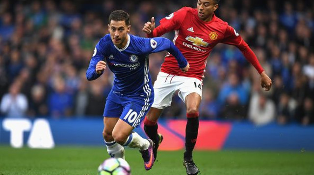 אדן הזאר במדי צ'לסי מול ג'סי לינגארד במדי מנצ'סטר יונייטד (צילום: Shaun Botterill)