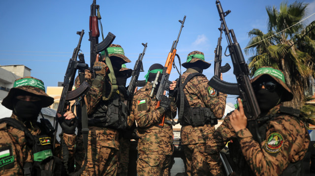 מחבלי חמאס ברצועת עזה (צילום: מג'די פתחי/TPS)