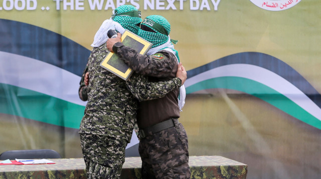 מחבלי חמאס (צילום: REUTERS/Hatem Khaled)