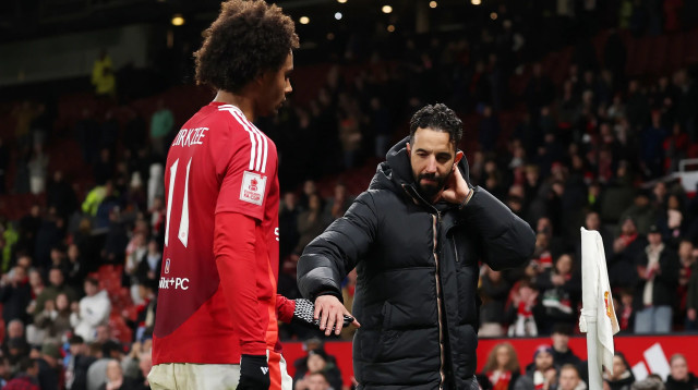 ג'ושוע זירקזי לצד רובן אמורים מאמן מנצ'סטר יונייטד (צילום: GettyImages)