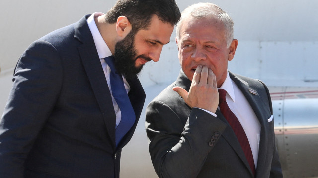 עבדאללה מלך ירדן ואל ג'ולאני (צילום: רויטרס)