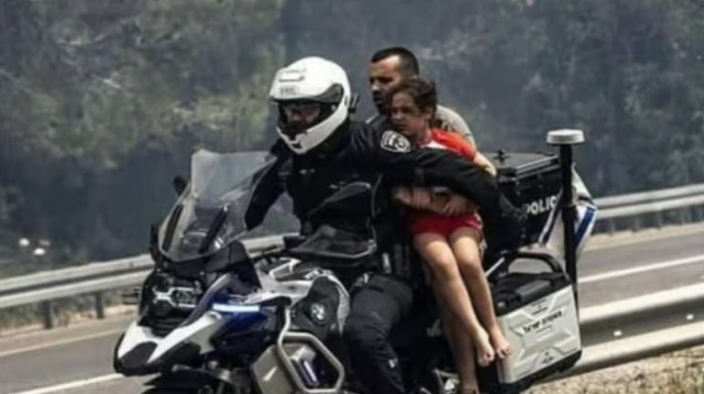 תיעוד החילוץ של המשפחה ע"י רס"מ חיים בן שאנן (צילום:  לפי חוק 27 א לזכויות יוצרים)