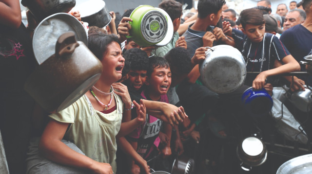 ילדים רעבים בעזה (צילום: רויטרס)