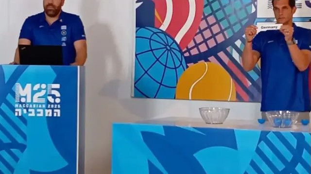 מנכ"ל המכביה, רואי הסינג, בהגרלת הבתים (צילום: יחצ)