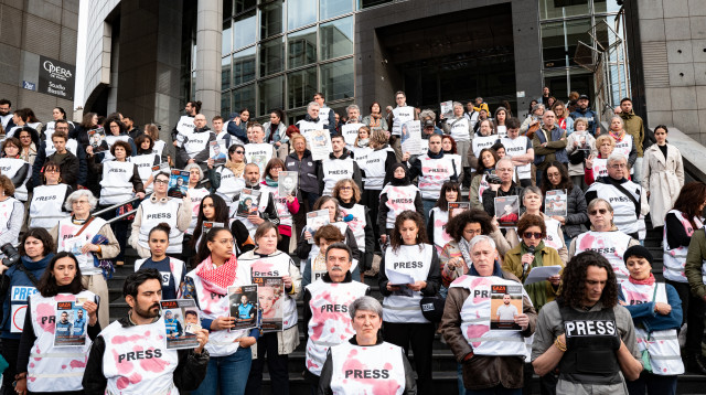 הפגנת "עיתונאים ללא גבולות" נגד ישראל על הלחימה בעזה (צילום: רויטרס)