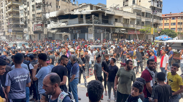 פלסטינים בעזה (צילום: רויטרס)