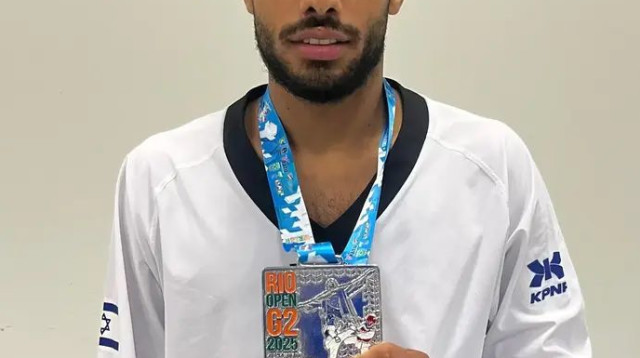עדנן מילאד עם המדליה (צילום: אתר רשמי, איגוד הטאקוונדו בישראל)