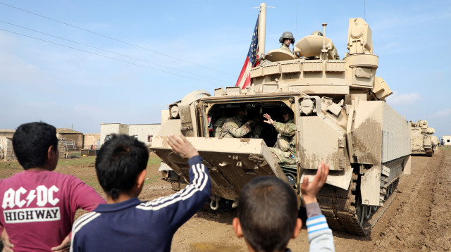 כוחות אמריקאיים בסוריה (צילום: REUTERS/Orhan Qereman)