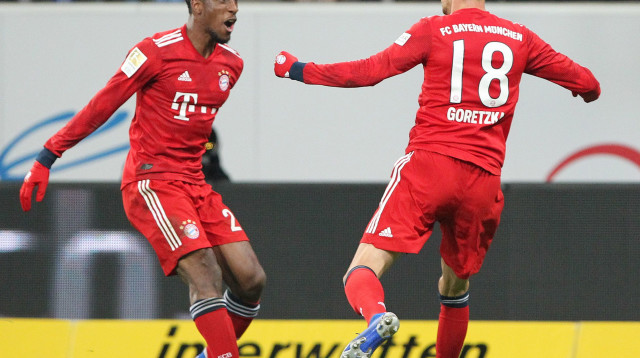 קינגסלי קומאן עם לאון גורצקה (צילום: AFP)