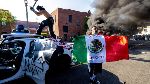 עימותים בלוס אנג'לס (צילום: REUTERS/Jill Connelly)