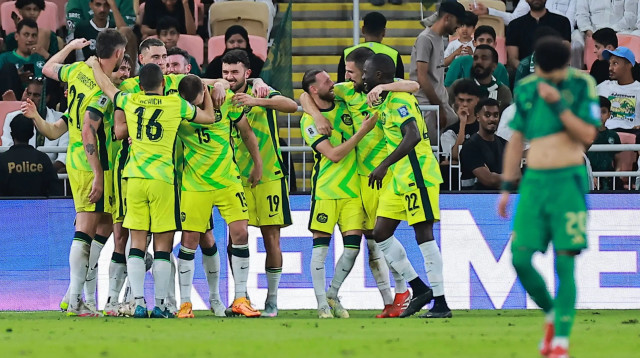 שחקני נבחרת אוסטרליה חוגגים (צילום: רויטרס)