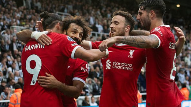 שחקני ליברפול חוגגים (צילום: Visionhaus)