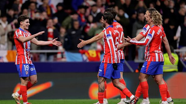שחקני אתלטיקו מדריד חוגגים (צילום: Soccrates Images)
