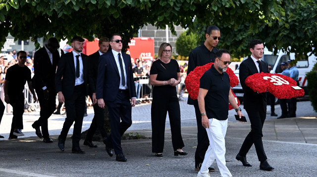 שחקני ליברפול בהלוויה של דיוגו ז'וטה (צילום: GettyImages)