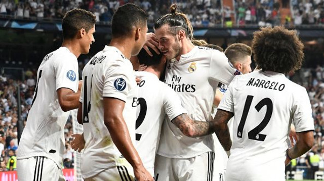 שחקני ריאל מדריד חוגגים (צילום: OSCAR DEL POZO)