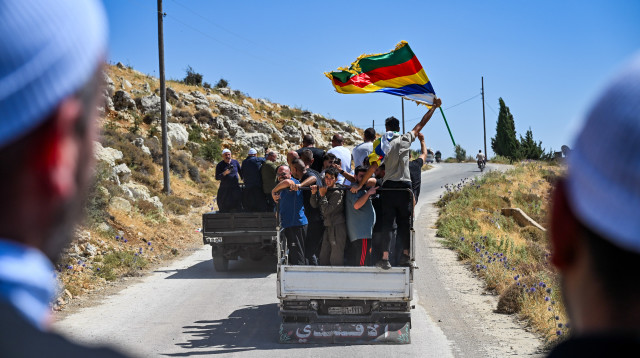 דרוזים בדרך לסוריה (צילום: מיכאל גלעדי, פלאש 90)
