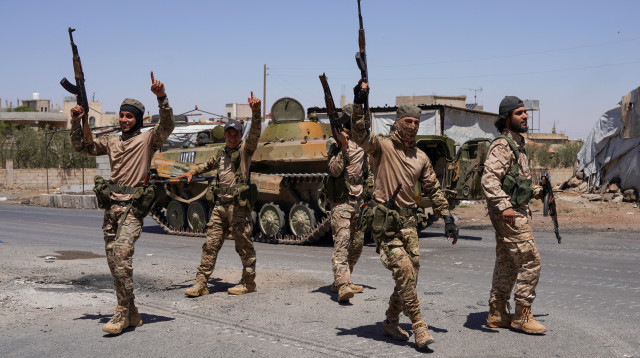 כוחות הצבא בסווידא, סוריה (צילום: REUTERS/Karam al-Masri)